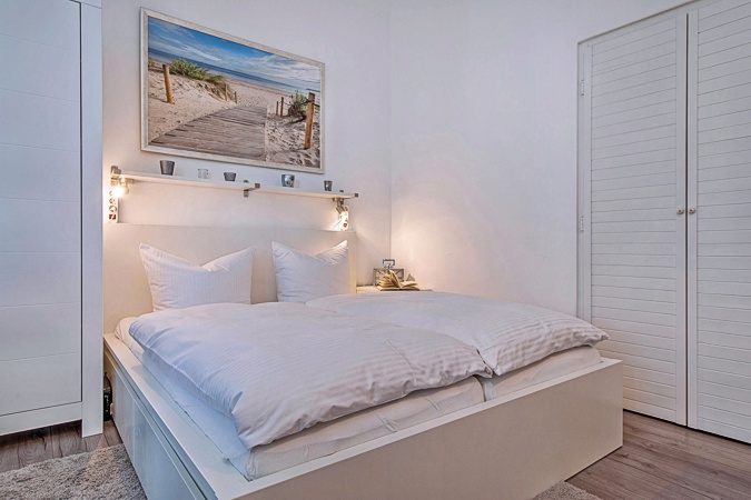 Appartement Meerzeit - Schlafbereich mit Kleiderschrank
